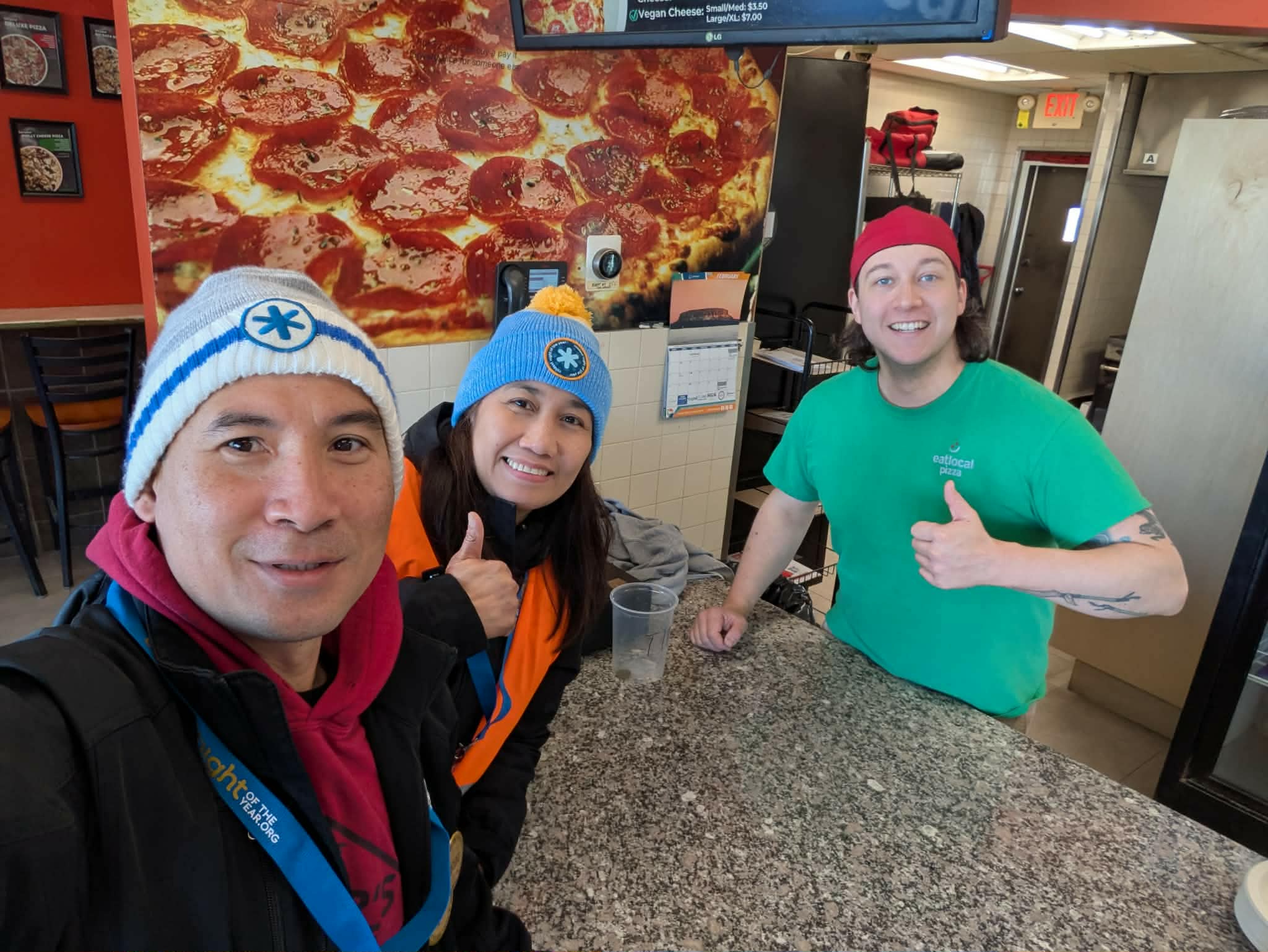 The Eat Local Pizza team behind the counter in Thunder Bay