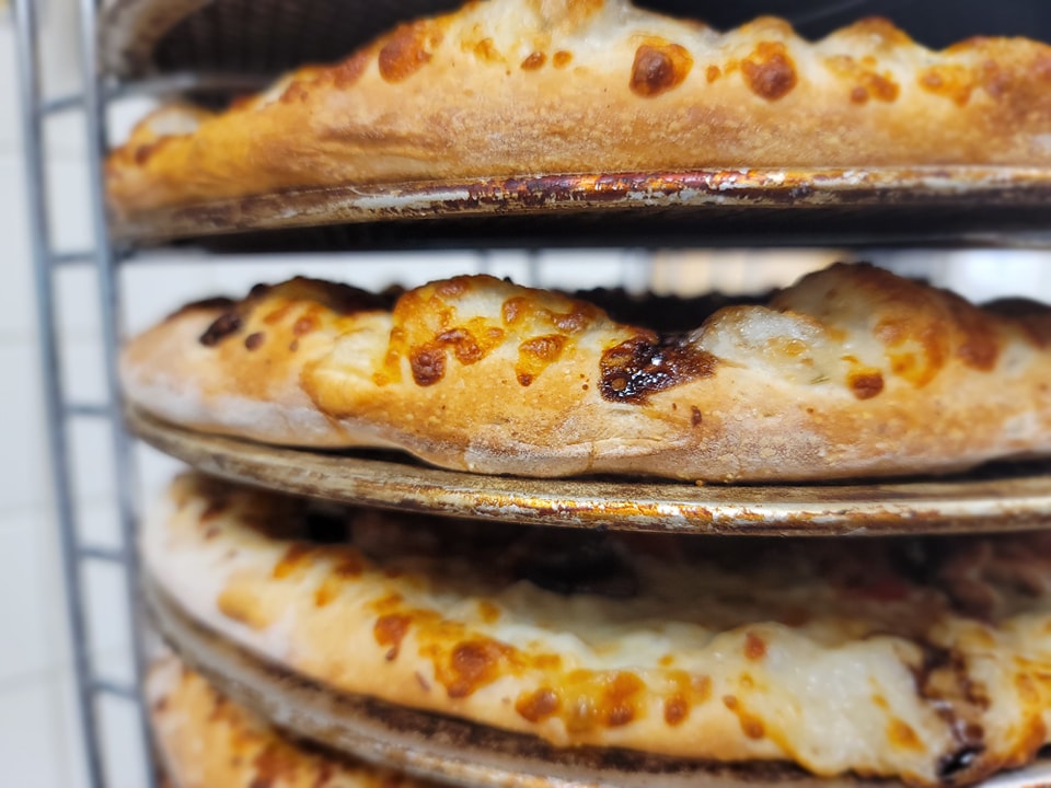 Eat Local Pizza storefront on Red River Road, Thunder Bay